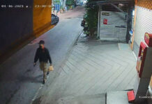 Police Say ‘Abduction’ of Protest Guard Was a Hoax A screenshot of a CCTV footage released by police shows a man investigators said to be Mongkol Santimethakul walking down the street near his residence on Jan. 16, 2021.