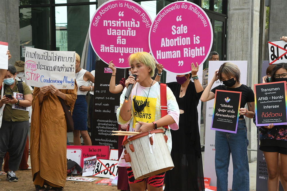 Activists stage a rally in front of the parliament to call for abortion rights on Jan. 25, 2021.