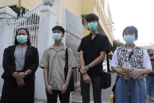 Khanaphot Yaemsanguansak, second from left, Laponpat Wangpaisit, and Benjamaporn Nivas at the Office of the Attorney General on Jan. 28, 2021.