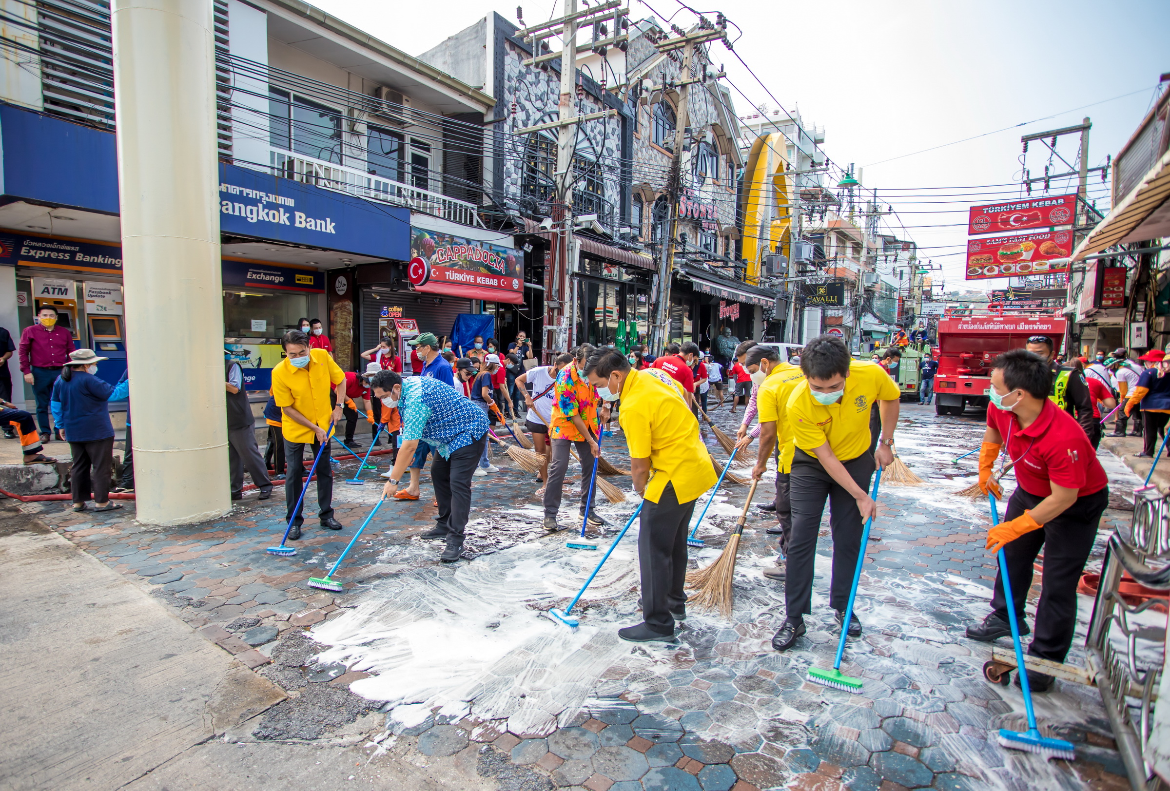 Officials participate in a “Big Cleaning Day” event at Pattaya's Walking Street on Jan. 28, 2021.
