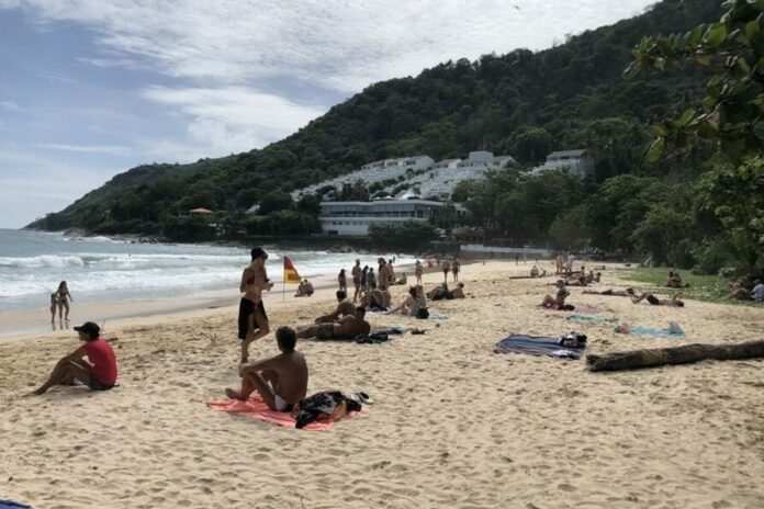 Few tourists are seen on a beach amid the coronavirus pandemic in Phuket province on June 9, 2020.