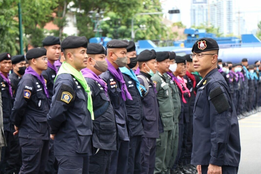 National police commissioner Suwat Chaengyodsuk inspects riot police in Bangkok on Sept. 20, 2020.