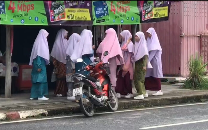 A group of Muslim women are seen in Yaha district, Yala province, on Jan. 3, 2021.