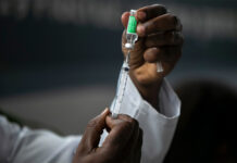 1st Vaccine to Be Handed Out on Valentine’s Day, But Questions Remain A healthcare worker prepares a dose of the Oxford-AstraZeneca vaccine for COVID-19, at the Oswaldo Cruz Foundation headquarters in Rio de Janeiro, Brazil on Jan. 23, 2021.Photo: Bruna Prado / AP