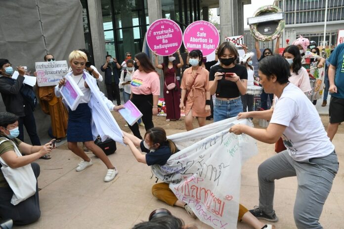 Activists stage a rally in front of the Parliament to call for abortion rights on Jan. 25, 2021. Activists stage a rally in front of the Parliament to call for abortion rights on Jan. 25, 2021.