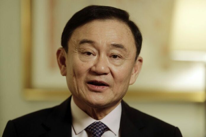In this March 9, 2016, file photo, Thailand's former Prime Minister Thaksin Shinawatra responds to questions during an interview in New York. Photo: Frank Franklin II / AP File