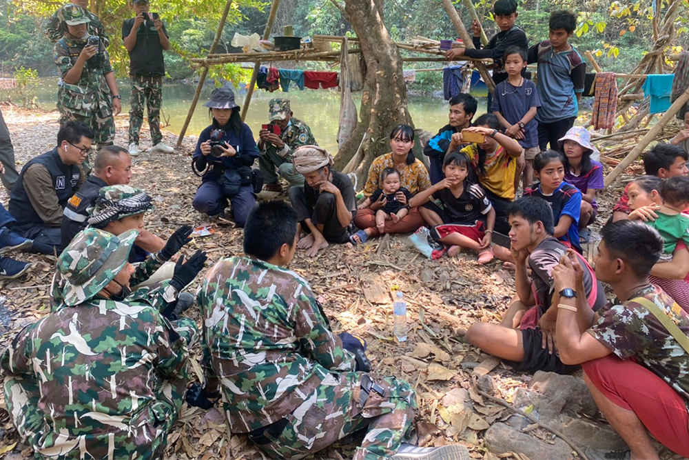 Park rangers negotiate with the remaining Karen villagers inside Kaeng Krachan National Park on Feb. 24, 2021.