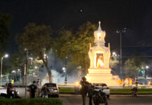 Witnesses Say Police Used Tear Gas at Grand Palace Crackdown A cloud of smoke emerges near the Phra Mae Thorani Shrine during the police crackdown on demonstrators on Feb. 13, 2021.