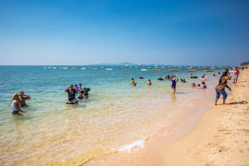 Tourists are seen on Jomtien Beach on Nov. 15, 2020.