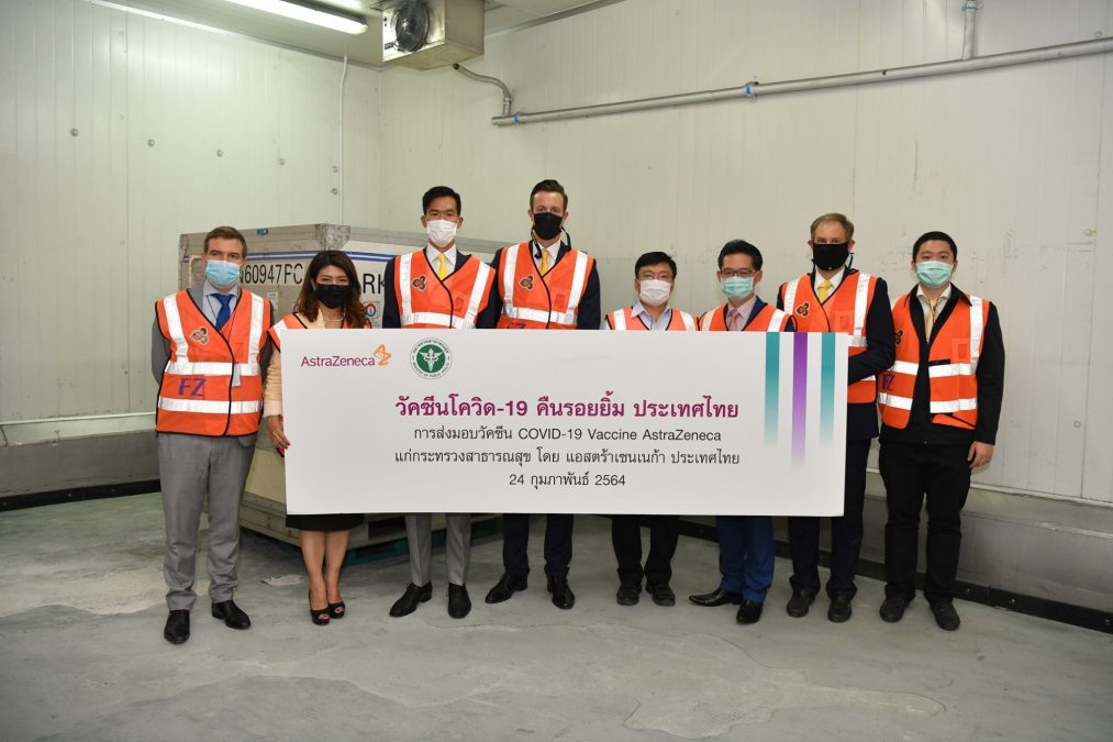 AstraZeneca's representatives and health officials take a photo with the container containing Thailand's first shipment of AstraZeneca vaccines on Feb. 24, 2021.