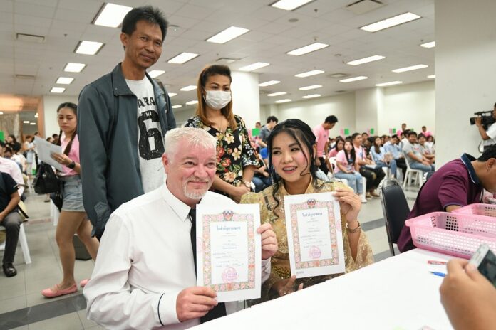 A couple registers their marriage in Bang Rak district on Feb. 14, 2019.