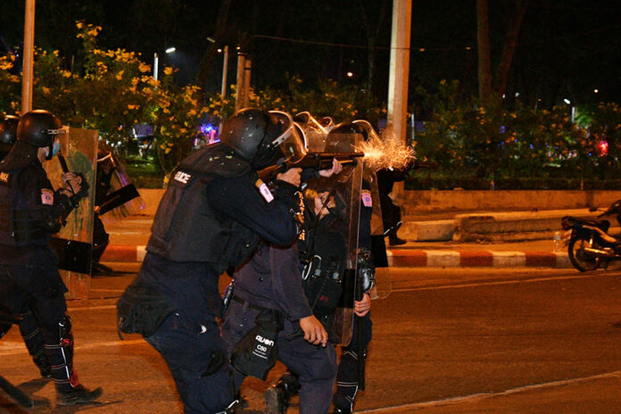 A riot police fires rubber bullets at anti-government demonstrators on Feb. 28, 2021. A riot police fires rubber bullets at anti-government demonstrators on Feb. 28, 2021.
