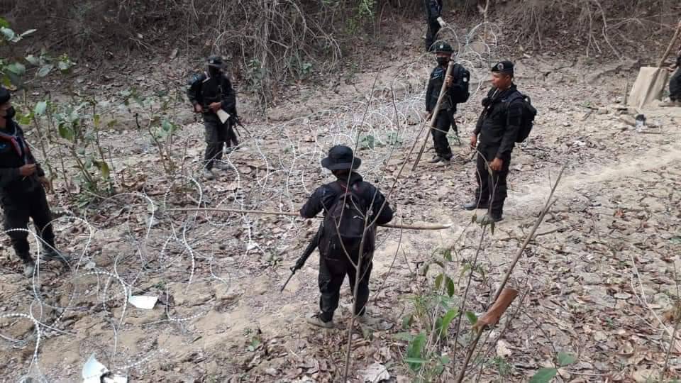 Security officers set up razor wires at the Thai-Myanmar border in Mae Hong Son province.