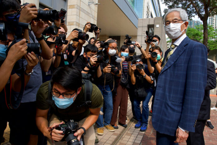Pro-democracy lawmaker Martin Lee, right, arrives at a court in Hong Kong Thursday, April 1, 2021. Photo: Vincent Yu / AP