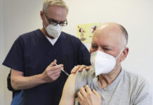 Official: EU Agency To Confirm AstraZeneca Blood Clot Link Manfred Haas, right, receives the AstraZeneca vaccine against the COVID-19 disease from his family doctor Oliver Funken in Rheinbach, Germany, Tuesday, April 6, 2021. Photo: Oliver Berg / dpa via AP