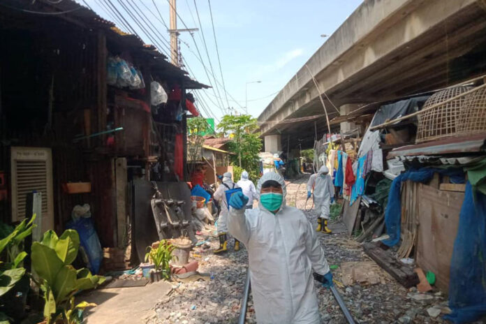 Workers disinfect Klong Toey slum community on April 24, 2021. Photo: Duang Prateep Foundation. Workers disinfect Klong Toey slum community on April 24, 2021. Photo: Duang Prateep Foundation.