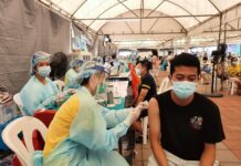 Opinion: Thailand’s Sinovac Dilemma A man receives a dose of COVID-19 vaccine at a vaccination center in Khlong Toey community in Bangkok on May 9, 2021.