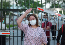 Court Grants Bail To Pro-Democracy Protest Leader Monarchy reform activist Panusaya "Rung" Sithijirawattanakul wais after her release from the Central Women's Correctional Institution on May 6, 2021.