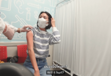 Opinion: The Good Thing About COVID-19: The Case of #IRoamAlone A screenshot of Mint's video shows her getting vaccinated at a CVS Pharmacy in New York City. Image: I Roam Alone / YouTube