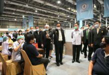 Opinion: Losing Faith in Thai Govt’s Timely Inoculation Abilities PM Prayut Chan-o-cha raises his thumb to a man who is receiving a COVID-19 vaccine at Central Plaza Ladprao mall on May 12, 2021.