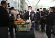 Iraqi Migrants Caught in Border Crisis in Belarus Fly Home
