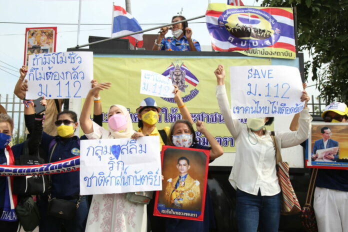A royalist group gathered to show their support for the lese-majeste law on Nov. 3, 2021 in Bangkok, submitting a letter to a representative of Parliament to oppose any move to amend the law.