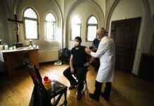 Undertakers, Rabbis Join Global Fight Promoting COVID Shots