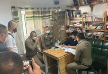Opinion: Thai Big Brother Watching Iceberg Underwater Police officers question Thanapol Eawsakul during a raid of Same Sky Books and Magazine office in Nonthaburi province on Jan. 20, 2022. Photo: Same Sky Books.