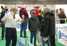 Boris Johnson: Health Service Under Strain, but No New Measures Britain's Prime Minister Boris Johnson, left, visits a vaccination hub in the at Stoke Mandeville Stadium in Aylesbury, England, Monday Jan. 3, 2022, as the booster vaccination programme continues. Photo: Steve Parsons / Pool via AP