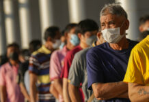 COVID-19 Health Emergency Could Be Over This Year, WHO Says Local residents wait on line to receive shots of the Pfizer vaccine at the Central Vaccination Center in Bangkok, Thailand, Monday, Jan. 10, 2022. Photo: Sakchai Lalit / AP