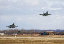 Russia Announces Sweeping Naval Drills Amid Ukraine Tensions Two Russian Su-30 fighter jets take off taking part in a training mission in Krasnodar Region, Russia, Wednesday, Jan. 19, 2022. Photo: Vitaliy Timkiv / AP