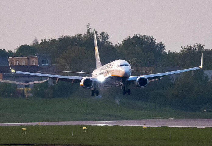 FILE - A Ryanair plane with registration number SP-RSM, that was carrying Belarus opposition journalist Raman Pratasevich from Athens to Vilnius and was diverted to Minsk, Belarus, after a bomb threat, lands at the International Airport outside Vilnius, Lithuania, on May 23, 2021. Photo: Mindaugas Kulbis / AP File