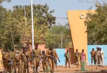 Soldiers Declare Military Junta in Control in Burkina Faso In this image made from video, Burkina Faso mutinous soldiers walk outside the Guillaume Ouedraogo military camp in Ouagadougou, Monday Jan. 24, 2022. Photo: AP