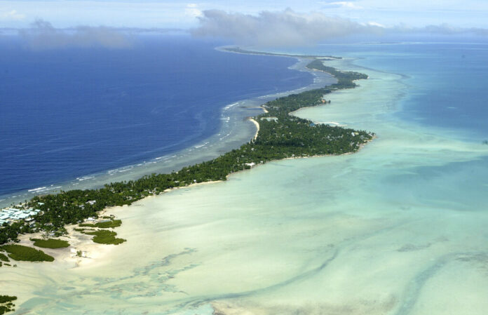 FILE - In this March 30, 2004, file photo, Tarawa atoll, Kiribati, is seen in an aerial view. Photo: Richard Vogel / AP File)