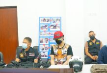 Man Arrested for Stealing Cash From Greek Tourist in Phuket Kanapong Sakhoncharoen, 24, during a news conference at Karon Police Station on Feb. 6, 2022.