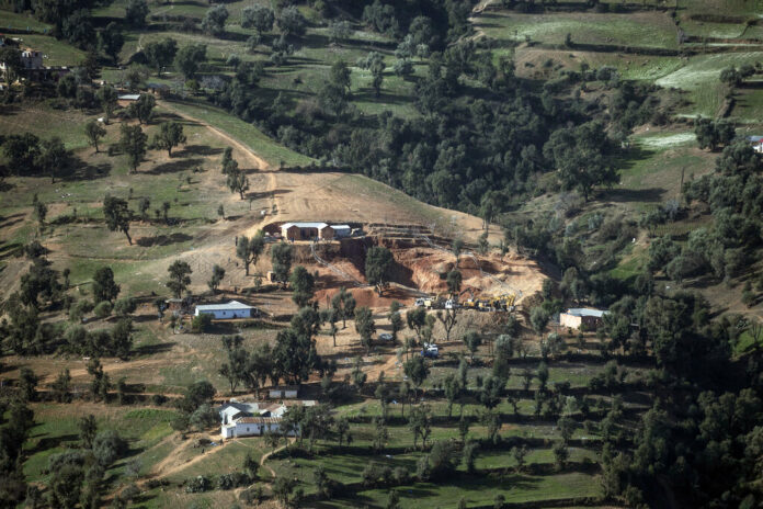 A view of the village of Ighran and the hill in which the rescue mission of 5-year-old Rayan had been taking place after he was stuck for several days, in Morocco's Chefchaouen province, Sunday, Feb. 6, 2022. Photo: Mosa'ab Elshamy / AP