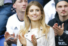 Police Probe Robbery Reported by German Celebrity FILE - Cathy Hummels, wife of Germany defender Mats Hummels, applauds prior to the Euro 2016 Group C soccer match between Northern Ireland and Germany at the Parc des Princes stadium in Paris, France, Tuesday, June 21, 2016. Photo: Michael Probst / AP File