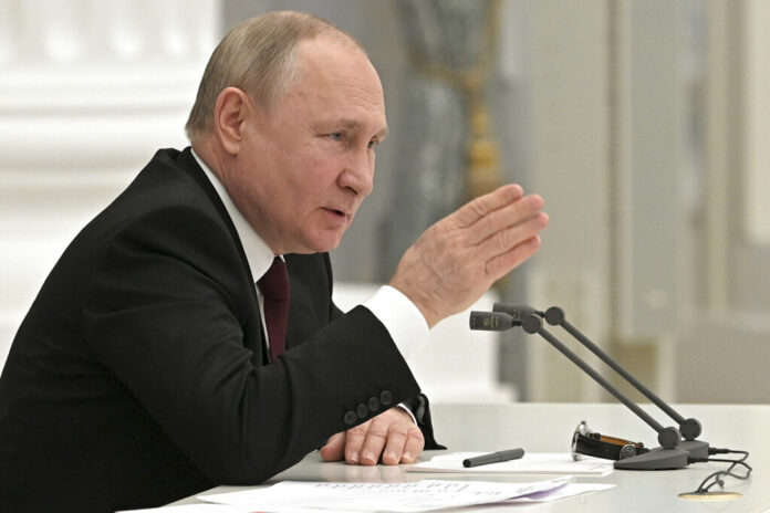 Russian President Vladimir Putin chairs a Security Council meeting in Moscow, Russia, Monday, Feb. 21, 2022. Photo: Sputnik / Kremlin Pool Photo via AP
