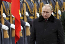 Putin Announces Ukraine Military Operation, Explosions Heard Russian President Vladimir Putin attends a wreath-laying ceremony at the Tomb of the Unknown Soldier, near the Kremlin Wall during the national celebrations of the 'Defender of the Fatherland Day' in Moscow, Russia, Wednesday, Feb. 23, 2022. Photo: Alexei Nikolsky / Kremlin Pool Photo via AP