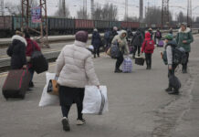 Russia Presses Invasion to Outskirts of Ukrainian Capital People waiting for a Kyiv bound train spread on a platform in Kostiantynivka, the Donetsk region, eastern Ukraine, Thursday, Feb. 24, 2022. Photo: Vadim Ghirda / AP
