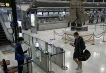 Interpol Issues Red Notice for Phuket Hitmen A still from CCTV footage showing one of the suspects leaving Thailand at Suvarnabhumi Airport on Feb. 6, 2022.