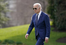 White House: Biden to Visit Poland on Europe Trip This Week President Joe Biden walks on the South Lawn of the White House before boarding Marine One, Friday, March 18, 2022, in Washington. Biden is spending the weekend at his home in Rehoboth Beach, Del. Photo: Patrick Semansky / AP