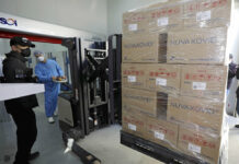Rich Countries Getting New COVID Vaccine Before Poorer Ones FILE - A worker moves boxes carrying Novavax's COVID-19 vaccine at SK Bioscience Co. in Andong, South Korea, on Feb. 9, 2022. Photo: Kim Hyun-tae/Yonhap via AP File