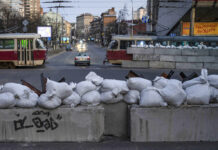 Putin’s War in Ukraine Nearing Possibly More Dangerous Phase FILE - A driver passes through a barricade built by territorial defense units downtown in Kyiv, Ukraine, March 19, 2022. Photo: Rodrigo Abd / AP
