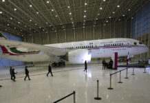 Mexico to Rent Out Presidential Jet for Weddings, Parties FILE - In this July 27, 2020 file photo, Mexican President Andres Manuel Lopez Obrador, center left, waves to the press as he arrives to give his daily, morning press conference in front of the former presidential plane at Benito Juarez International Airport in Mexico City. Photo: Marco Ugarte / AP File