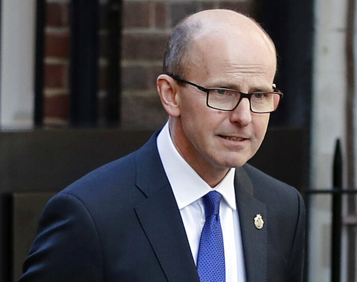 FILE - In this Feb. 14, 2019 file photo, Jeremy Fleming, head of the British Government Communications Headquarters (GCHQ) walks in London. Photo: Frank Augstein / AP File