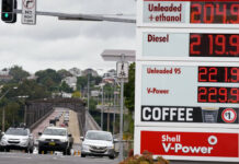 World Bank Says War Shocks To Drag On Asian Economies FILE - Motorists drive past a fuel price display in Sydney, Tuesday, March 29, 2022. Photo: Rick Rycroft / AP File
