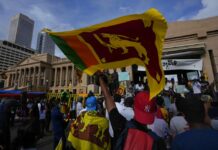 Sri Lankan President Admits Mistakes Led to Economic Crisis Sri Lankans wave flags and shout anti-government slogans during an ongoing protest outside president's office in Colombo, Sri Lanka, Monday, April 18, 2022. Photo: Eranga Jayawardena / AP