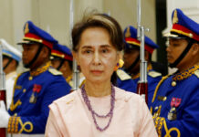 Aung San Suu Kyi Has Been Moved From Prison to House Arrest Due to Heat Wave, Myanmar Military Says FILE - Myanmar's State Counselor Aung San Suu Kyi reviews an honor guard at the Peace Palace in Phnom Penh, Cambodia on April 30, 2019. Photo: Heng Sinith / AP File