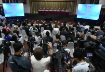 Opinion: Promises and Pitfalls of Thailand’s Social Media Landscape Photographers and journalists at a police press conference on the investigation into the death of actress Nida "Tangmo" Patcharaveerapong in Nonthaburi province on Apr. 26, 2022.